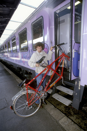 Voyageur de trzin avec un tandem